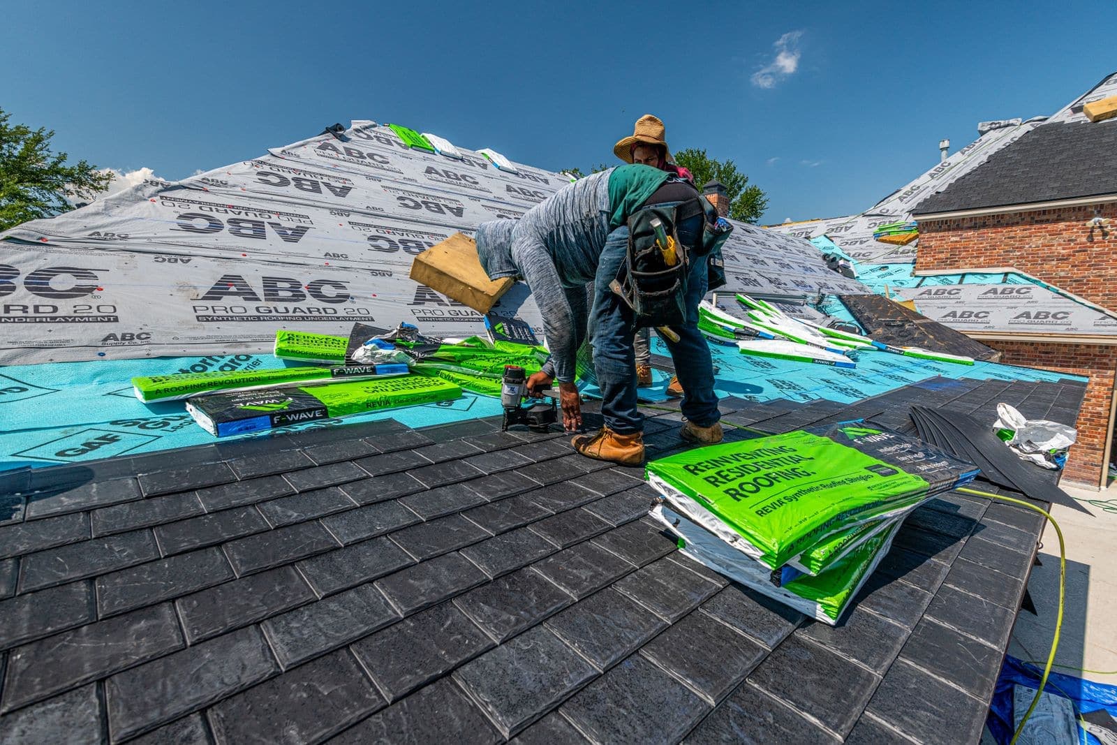 Roof stripped to decking with underlayment going on