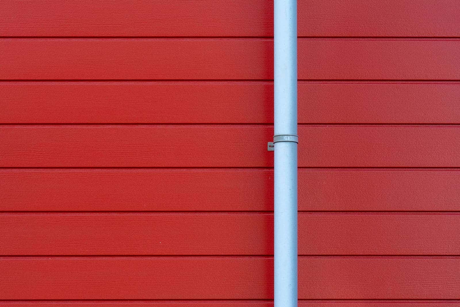 New downspout installed on a house